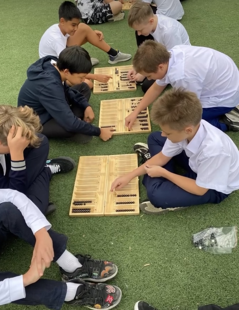 Игра “ Тоғызқұмалақ”